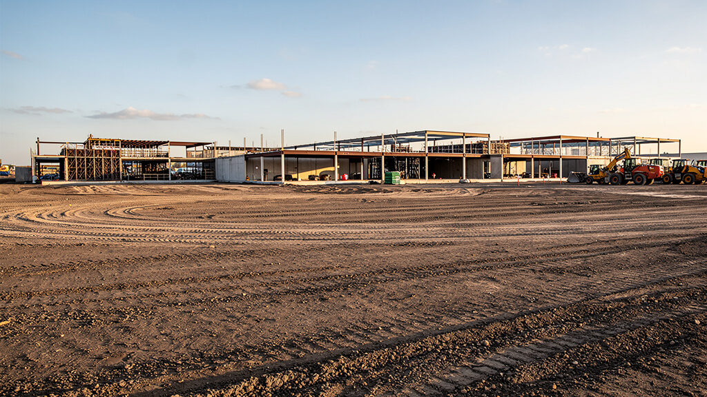 Drywall and mixed construction debris staged for removal