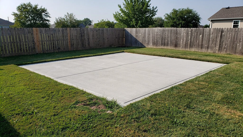 Shed debris and roofing materials staged for removal